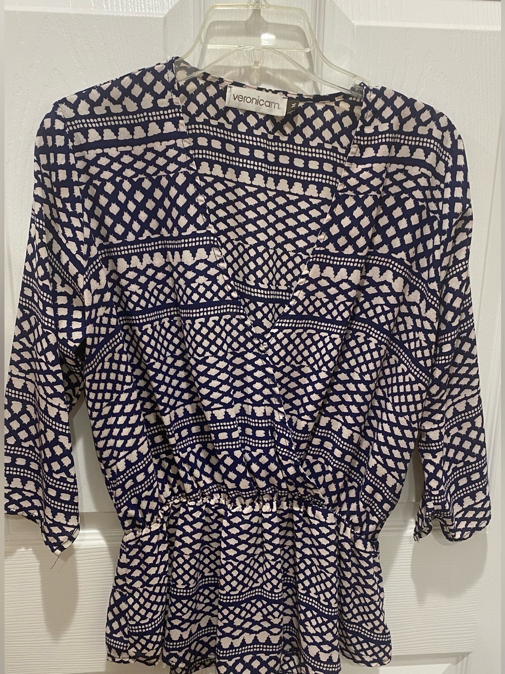 Veronicam Navy and Cream Geometric Wrap Peplum Top